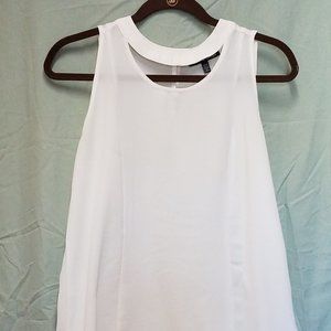 Cool Summer tank top with alluring cut outs.